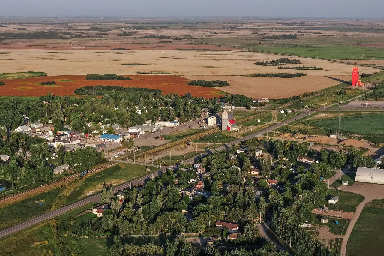 Aerial view of the town and surrounding farmland, 2026-08-21 21:02:24